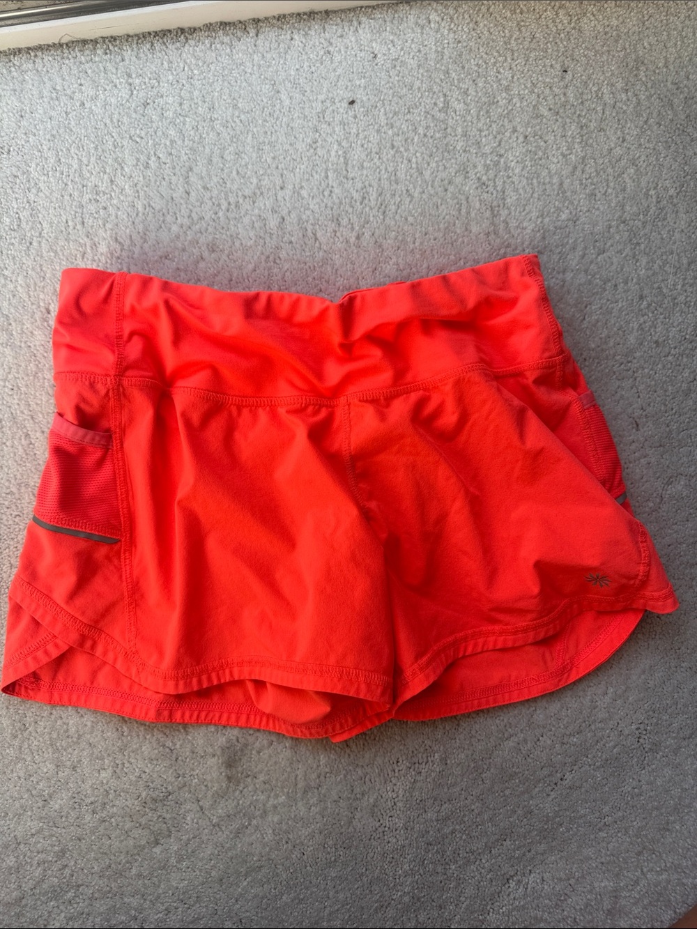 Athleta Women’s Bright Coral Active Shorts